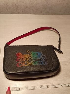 Coach Black Leather Wristlet with Multicolor Logo and Red Strap
